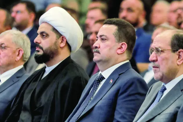 Irak Başbakanı Muhammed Şiya el-Sudani, Bağdat'ta Nuri el-Maliki ve Kays el-Hazeli ile (Arşiv- AFP)