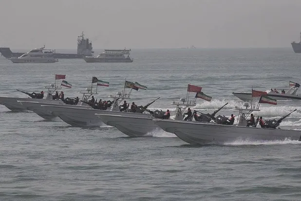 Revolutionary Guard speedboats are seen during maneuvers in the Strait of Hormuz. (Tasnim) 