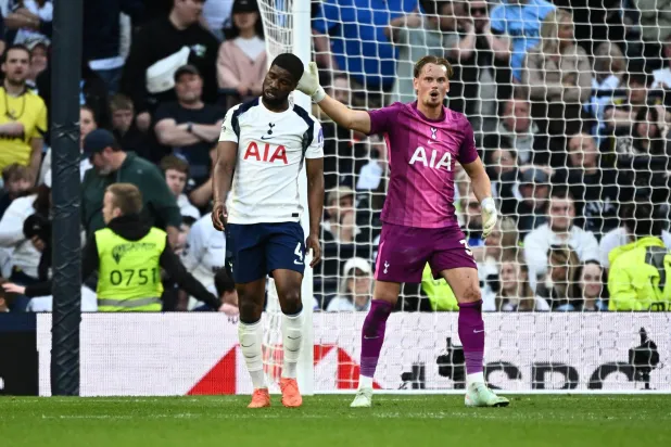 Football - Premier League - Tottenham Hotspur v Brighton & Hove Albion - Tottenham Hotspur Stadium, London, Britain - April 18, 2026 Tottenham Hotspur's Kevin Danso look dejected with Antonin Kinsky after Brighton & Hove Albion's Georginio Rutter scores their second goal. (Reuters)