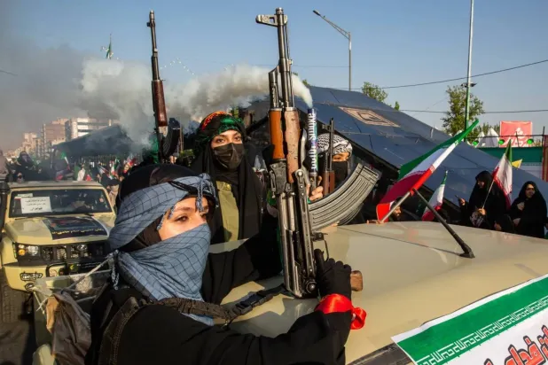 Female members of Iran's Basij militia are seen during a government rally in support of Mojtaba Khamenei. (The New York Times) 