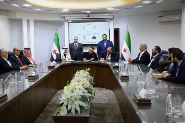 خلال توقيع مذكرة التفاهم في دمشق (سانا)