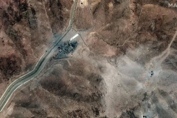 Airstrike craters are seen at the perimeter installation on Iran's Fordo Fuel Enrichment Plant (FFEP), Qom, Iran, June 24, 2025. (AFP)
