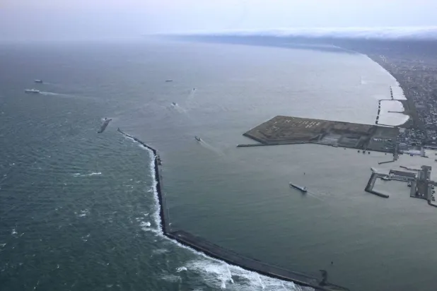 Vessels depart a port in Tomakomai, Hokkaido Prefecture, Japan, where a tsunami warning was issued following an earthquake, April 20, 2026, in this photo taken by Kyodo. (Kyodo/via Reuters) 