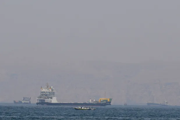  Ships and boats in the Strait of Hormuz off the coast of Musandam, Oman, April 20, 2026. (Reuters)