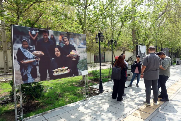 Iranians gather at a park, in Tehran, Iran, 21 April 2026. EPA/ABEDIN TAHERKENAREH