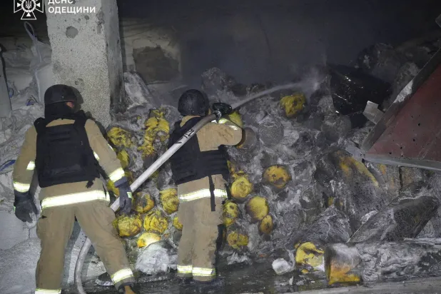 Rescuers work at the site of a Russian drone strike as port infrastructure was hit, amid Russia's attack on Ukraine, in Odesa region, Ukraine April 22, 2026. (Press service of the State Emergency Service of Ukraine in Odesa region/Handout via Reuters) 