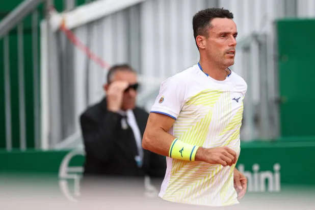 لاعب التنس الإسباني روبرتو باوتيستا أغوت (أ.ف.ب)