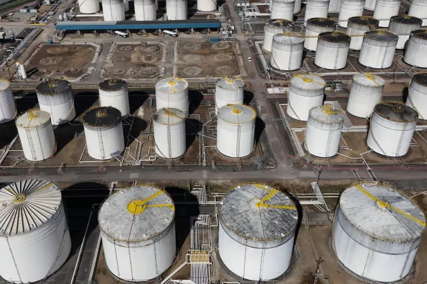 An image made with a drone shows oil gas and fuel storage units at the Navigator Terminal in Grays, Britain, 14 April 2026. EPA/NEIL HALL