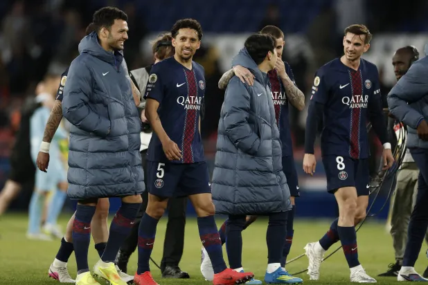 Soccer Football - Ligue 1 - Paris St Germain v FC Nantes - Parc des Princes, Paris, France - April 22, 2026 Paris St Germain's Marquinhos, Goncalo Ramos and Fabian Ruiz celebrate after the match REUTERS/Benoit Tessier
