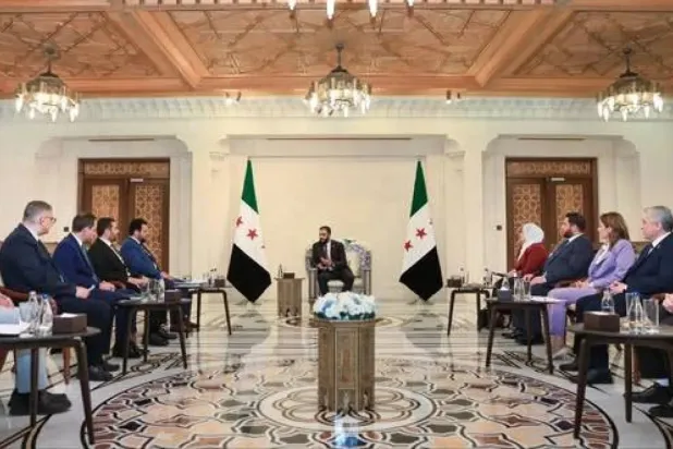 President Ahmed al-Sharaa meets members of the Supreme Committee for People’s Assembly elections, July 2025 (Presidency page)

