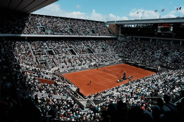 FILE - The crowd watch Norway's Casper Ruud playing against Spain's Rafael Nadal on the court Philippe Chatrier, known as center court, during their final match of the French Open tennis tournament at the Roland Garros stadium on June 5, 2022 in Paris. (AP Photo/Thibault Camus, File)