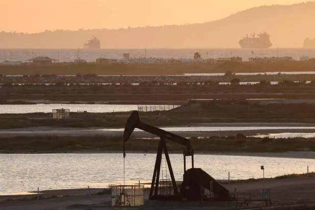 HUNTINGTON BEACH, CALIFORNIA - APRIL 23: A pumpjack stands idle in the Huntington Beach oil field on April 23, 2026 in Huntington Beach, California. Mario Tama/Getty Images/AFP 