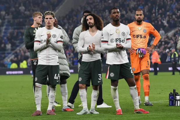 Soccer Football - Premier League - Everton v Chelsea - Hill Dickinson Stadium, Liverpool, Britain - March 21, 2026 Chelsea's Alejandro Garnacho, Marc Cucurella and Jorrel Hato look dejected as they applaud fans after the match REUTERS