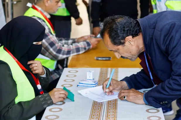 A Palestinian man votes during the municipal election at a polling station in Deir al-Balah, central Gaza Strip April 25, 2026. REUTERS/Mahmoud Issa 