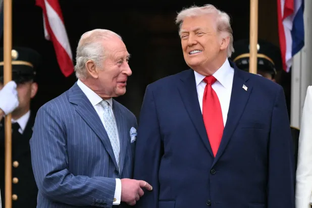 US President Donald Trump speaks with Britain's King Charles III during an arrival ceremony on the South Lawn of the White House in Washington, DC, on April 28, 2026. (AFP)