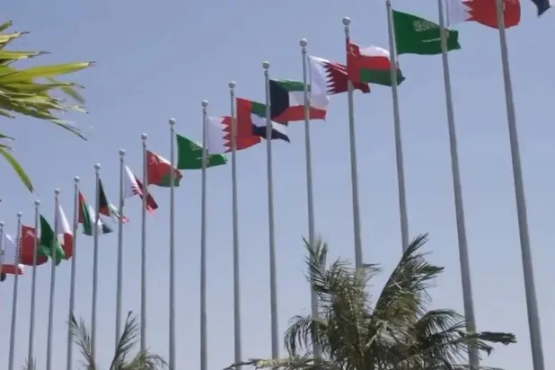 The flags of Gulf countries are raised in Jeddah ahead of the summit (SPA)