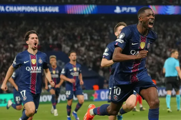 PSG's Ousmane Dembele celebrates after scoring his side's third goal during a Champions League semifinal, first leg, soccer match between Paris Saint-Germain and Bayern Munich in Paris, Tuesday, April 28, 2026. (AP Photo/Aurelien Morissard)