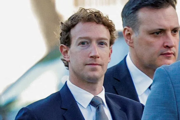 FILE PHOTO: Meta Platforms CEO Mark Zuckerberg arrives outside court to take the stand at trial in a key test case accusing Meta and Google's YouTube of harming kids' mental health through addictive platforms, in Los Angeles, California, US, February 18, 2026.  REUTERS/Mike Blake