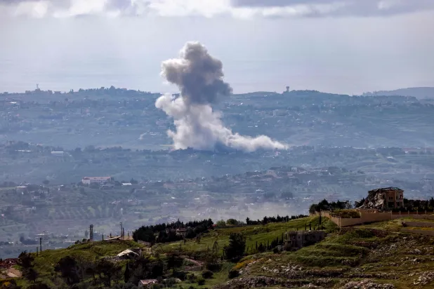 This picture taken from a position in Upper Galilee in northern Israel, near the border with Lebanon, shows smoke rising during Israeli strikes in southern Lebanon on April 27, 2026. (AFP)