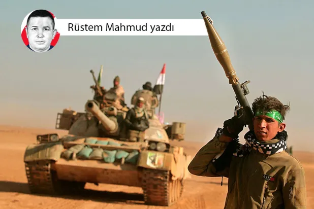 Fotoğraf: Musul'un güneybatısındaki bir çöl bölgesinde Haşdi Şabi Güçleri'nden bir savaşçı (AFP)