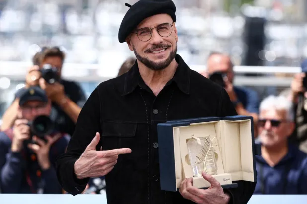John Travolta, 79. Cannes Film Festivali'nde Onursal Altın Palmiye ödülüne layık görüldü (Reuters)