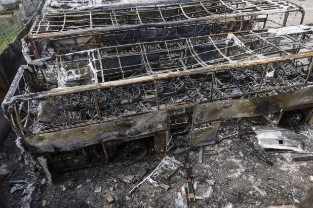 Burned buses following a Russian strike on a residential area in Odesa, southwestern Ukraine, 30 April 2026. (EPA)