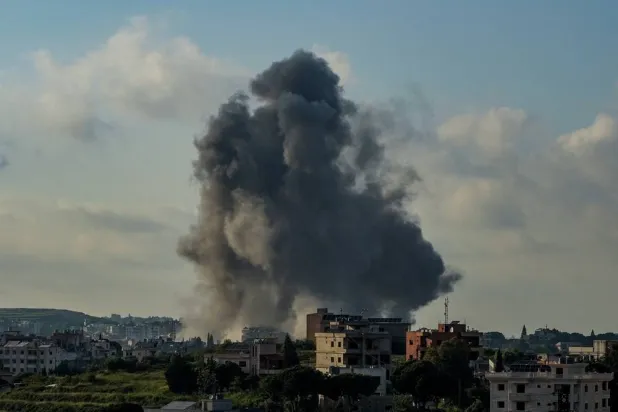  Smoke rises in Habboush following Israeli strikes, as seen from Nabatiyeh, Lebanon, May 1, 2026. (Reuters)