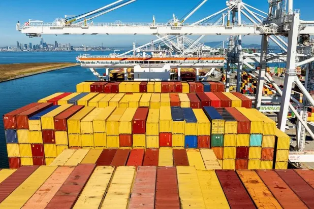 Cargo containers line a ship at the Port of Oakland on Wednesday, Aug. 6, 2025, in Oakland, Calif. (AP)