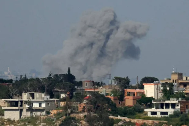 This photograph taken from the southern Lebanese area of Marjayoun shows smoke rising from the site of Israeli airstrikes that targeted the village of Zawtar al-Sharqiyah, on May 3, 2026. I(Photo by AFP)
