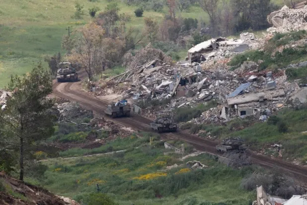Israeli troops maneuver on the Lebanese side of the border, as seen from the Upper Galilee in northern Israel, 04 May 2026, amid a ceasefire between Israel and Lebanon. (EPA)