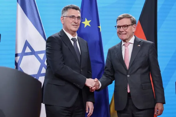 German Foreign Minister Johann Wadephul (R) and Israeli Foreign Minister Gideon Saar shake hands as they attend a news conference after their talks in Berlin, Germany, 05 May 2026. (EPA)