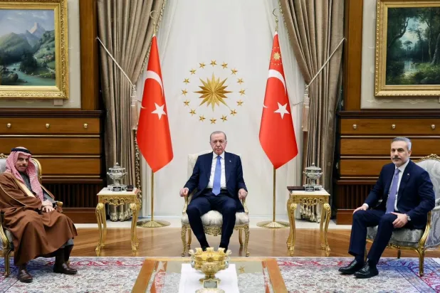 The Turkish President receives the Saudi Foreign Minister in the presence of his Turkish counterpart in Ankara on Wednesday (SPA)
