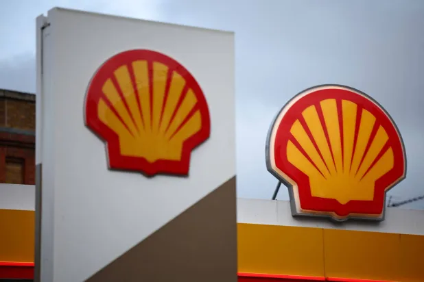 (FILES) The Shell logo is pictured above a Shell petrol station in London on January 30, 2026. (Photo by HENRY NICHOLLS / AFP)