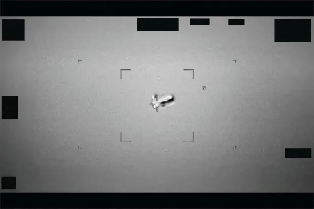  A football-shaped body reported by the US Indo-Pacific Command in 2024 is seen as part of a series of documents of unidentified aerial phenomenon (UAP) released by the US Defense Department on May 8, 2026. (Department of Defense/Handout via Reuters)