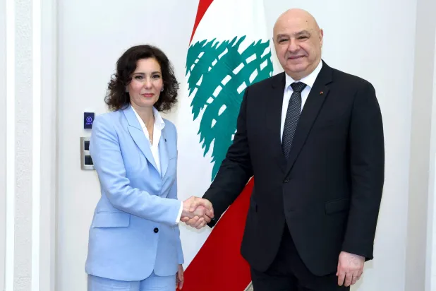 This handout photograph released by the Lebanese Presidency's press office shows European Commissioner for Equality, Preparedness and Crisis Management Hadja Lahbib (L) being received by Lebanon's President Joseph Aoun (R) at the presidential palace in Baabda, east of Beirut, on May 8, 2026. (Lebanese Presidency Press Office / AFP) 