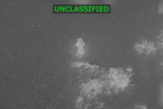 This screen grab from a video posted on the X account of US Southern Command (SOUTHCOM) on May 8, 2026, shows a vessel after being struck at the direction of Commander General Francis L. Donovan on May 8, 2026.. (Photo by US Southern Command / AFP) 