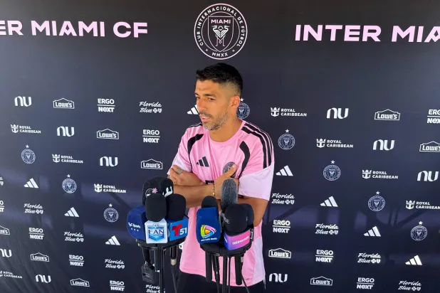 Inter Miami forward Luis Suarez speaks during an MLS soccer news conference following training, Wednesday, May 6, 2026, in Fort Lauderdale, Fla. (AP Photo/Daniel Kozin)