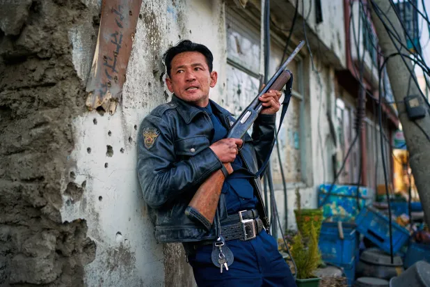  This image released by Neon shows Hwang Jung-min in a scene from "Hope." (Neon via AP) 