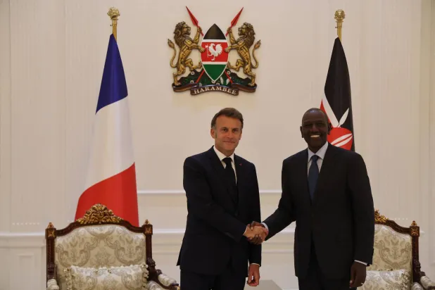 French President Emmanuel Macron (L) shakes hands with Kenyan President William Ruto (R) during a reception at State House ahead of the Africa Forward: Africa- France Partnerships for Innovation and Growth Summit in Nairobi, on May 10, 2026. (AFP)