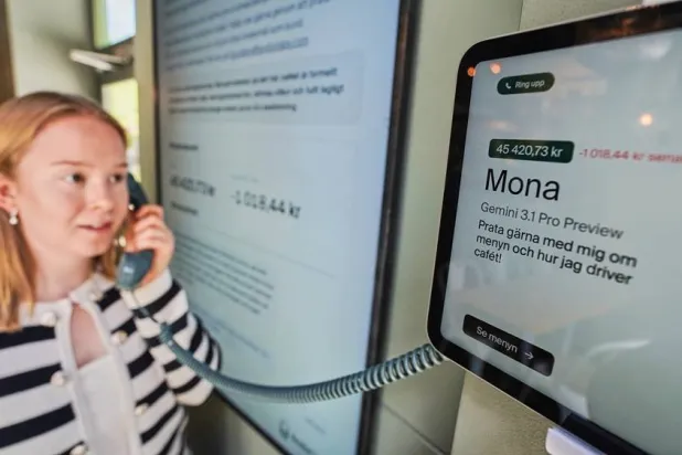  Hanna Petersson, a member of Andon Labs’ technical staff, uses a telephone handset to speak with Andon Café's AI agent "Mona" in Stockholm, Sweden, Tuesday, May 5, 2026. (AP) 