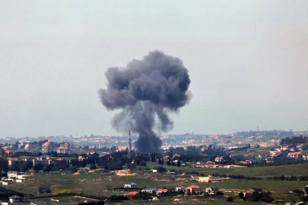 Smoke rises as a result of an Israeli strike on a southern Lebanon village as seen from the Upper Galilee on the Israel-Lebanon border, 11 May 2026. (EPA)