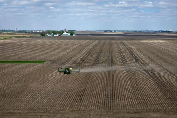 An aerial view shows Jerry Fuerstenau planting a farm field on May 06, 2026 near West Bend, Iowa. (Getty Images/AFP)