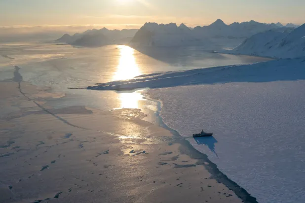 (FILES) This photograph shows the scientific ice-going "Kronprins Haakon" sailing through the sea ice in eastern Spitzbergen, in the Svalbard archipelago, on April 10, 2025.  (Photo by Olivier MORIN / AFP)