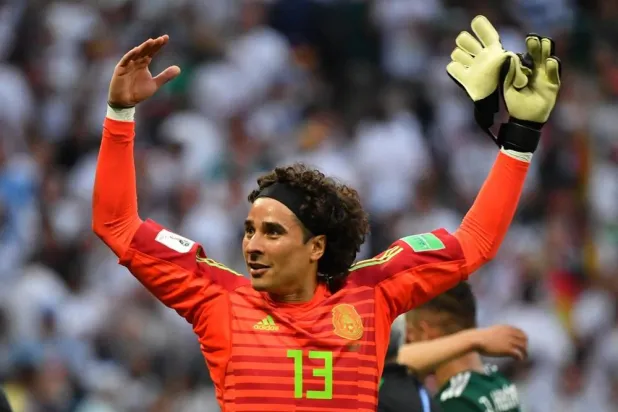 Mexico’s goalkeeper Guillermo Ochoa celebrates their 1-0 victory at the end of the Russia 2018 World Cup Group F football match between Germany and Mexico at the Luzhniki Stadium in Moscow on June 17, 2018. (AFP via Getty Images)  