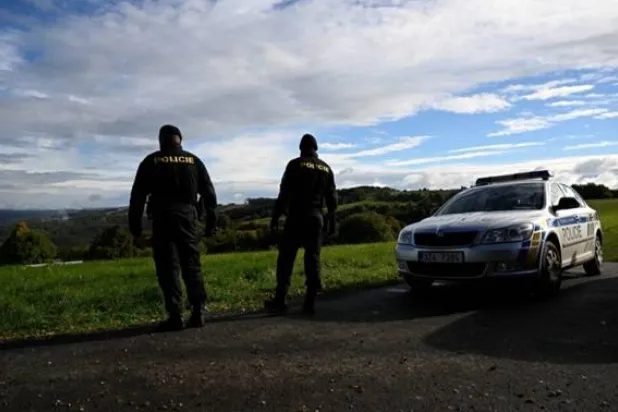 
Police officers patrol the Czech-Slovak green border near Stary Hrozenkov, Czech Republic, September 29, 2022. REUTERS/Radovan Stoklasa
