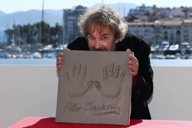  New Zealand filmmaker Peter Jackson, who was awarded with an Honorary Palme d'Or, displays his handprints during a ceremony on the "Walk of Fame" of the Croisette at the 79th Cannes Film Festival in Cannes, France, May 13, 2026. (Reuters)