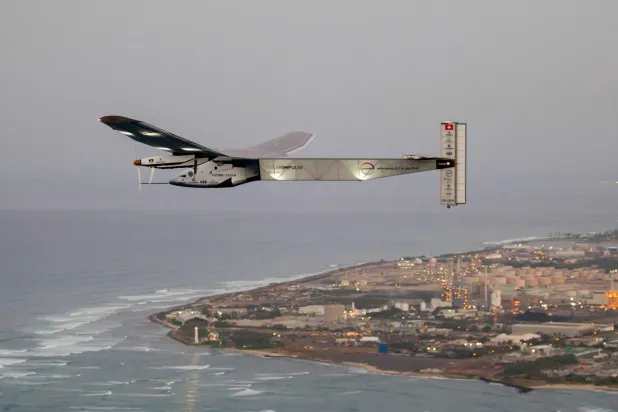 (FILES) The Solar Impulse 2 solar powered airplane flies off Kapolei, Hawaii, on March 3, 2016 on a all-day test flight. (Photo by Eugene TANNER / AFP)