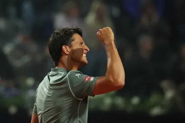 Tennis - Italian Open - Foro Italico, Rome, Italy - May 13, 2026 Italy's Luciano Darderi reacts during his quarter final match against Spain's Rafael Jodar REUTERS/Claudia Greco