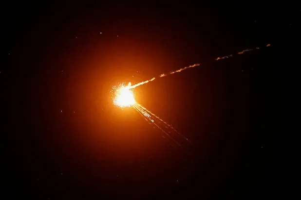 Ukrainian servicemen hit a Russian missile during a Russian missile and drone strike, amid Russia's attack on Ukraine, in Kyiv, Ukraine May 14, 2026. (Reuters)