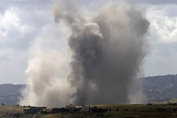 Smoke rises from the site of an Israeli airstrike that targeted the southern Lebanese village of Kfar Tibnit on May 15, 2026. (AFP)